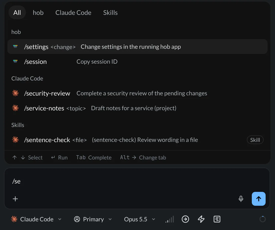 The slash menu filtered by /se, showing hob’s /settings and /session entries, two Claude Code commands, and a skill with its Skill badge above the composer
